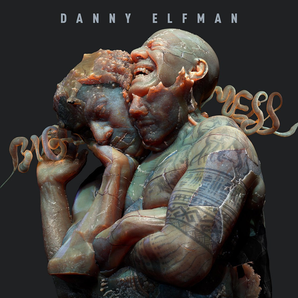 Image with black background that says - Danny Elfman - in grey letters. And has a wax looking image of Danny Elfman with the words - Big - on his left side and - Mess - on the right side.