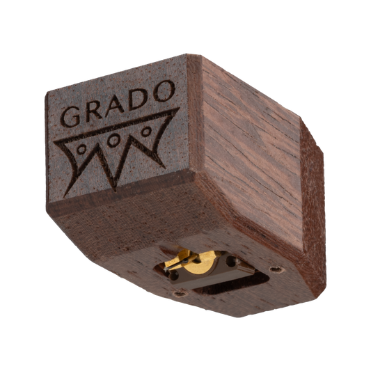 Close up photo of a Lineage Series Cartridge which is wooden and has the words GRADO and a symbol that resembles an upside down crown engraved in it.
