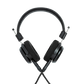 Photo of Grado S150 Headphones on a white background taken from the back - the black cables can be seen coming out of the headphone.