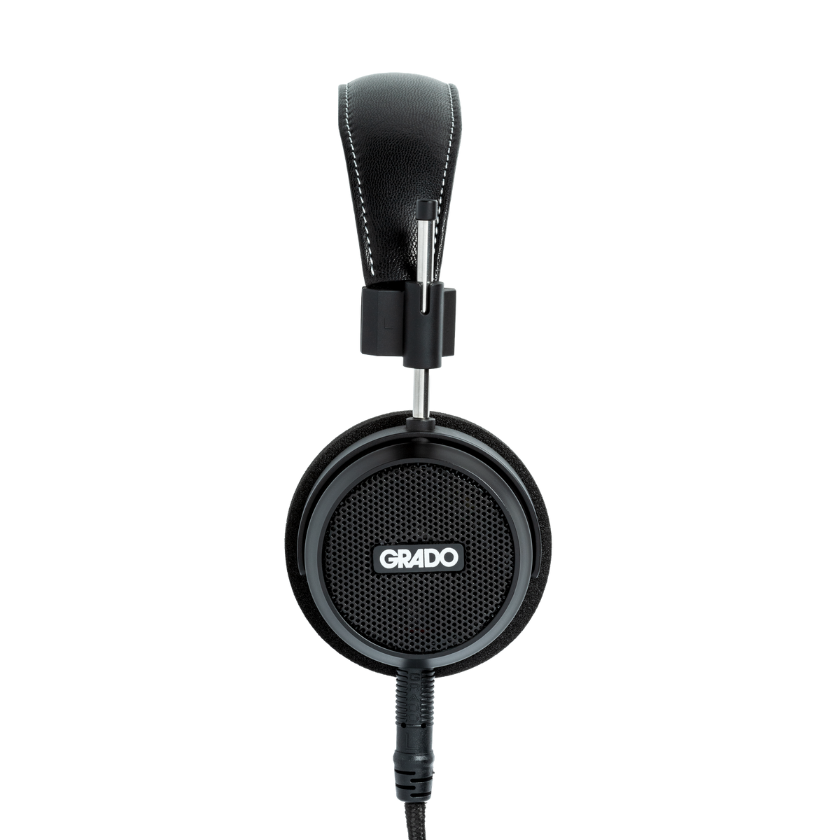 Photo of Grado S150 Headphones taken from the side - the Grado logo is featured in the center of the ear cup.