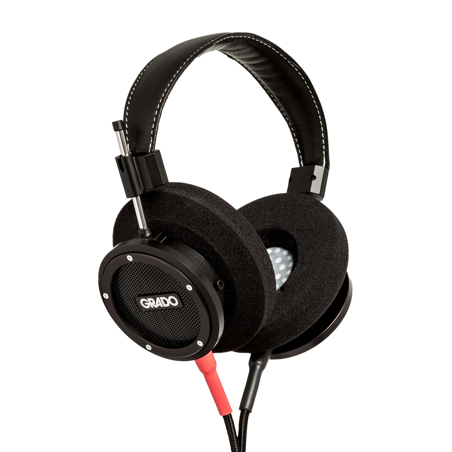 Photo of Grado S750 Headphones taken from the 3/4 view - the Grado logo is featured in the center of the ear cup and the red/black cables can be seen coming out of the headphone.